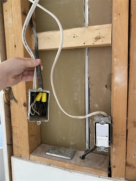 missing electrical box behind drywall